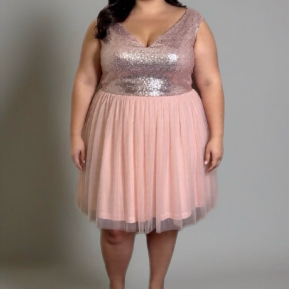 Plus size blush , slightly above the knee formal dress. Rose gold sequin bust